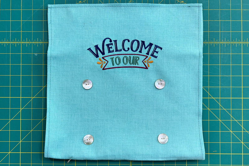 'Welcome to Our House' Pillow add buttons